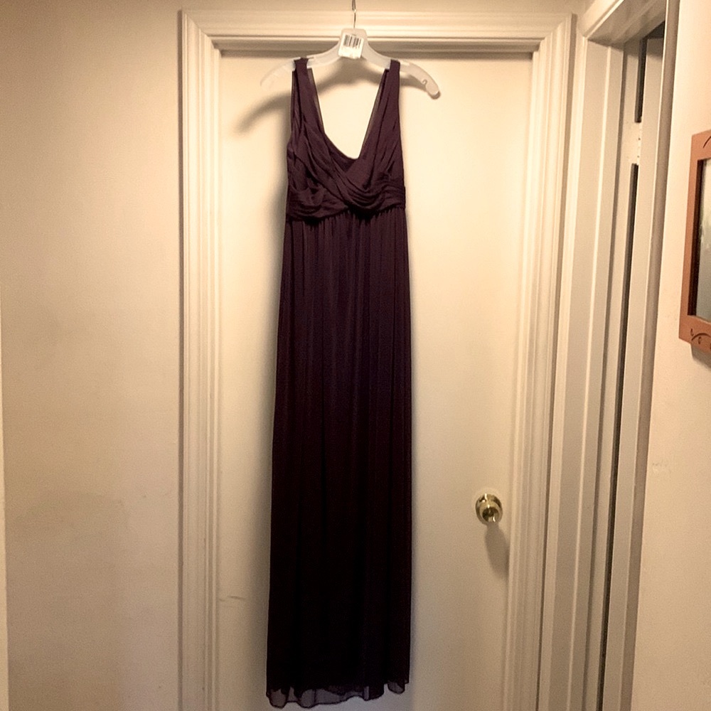 David’s bridesmaid dress size 4 in plum that originally cost me $159.95.